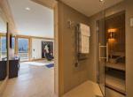 Kings-avenue-gstaad-sauna-extérieur-jacuzzi-couvert-parking-cinéma-gym-chauffage-bottes-foyer-zone-gstaad-002-15