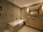 Kings-avenue-gstaad-sauna-extérieur-jacuzzi-couvert-parking-cinéma-gym-chauffages-bottes-foyer-zone-gstaad-002-22