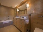 Kings-avenue-gstaad-sauna-extérieur-jacuzzi-couvert-parking-cinéma-gym-chauffage-bottes-foyer-zone-gstaad-002-27