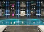kings-avenue-luxury-chalet-courchevel-003-front-view-inside-swimming-pool