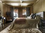 kings-avenue-luxury-chalet-courchevel-004-chambre-à-coucher-avec-tv