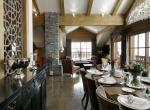 kings-avenue-luxury-chalet-courchevel-004-dining-table-with-relaxation-area-and-views
