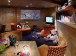 kings-avenue-luxury-chalet-courchevel-005-kids-playroom-with-tv