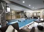 kings-avenue-luxury-chalet-courchevel-007-side-view-spa-area-with-indoor-swimming-pool