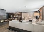 kings-avenue-luxury-chalet-courchevel-008-kitchen-and-sitting-area
