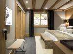 kings-avenue-luxury-chalet-courchevel-009-bedroom