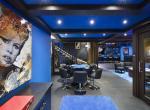 kings-avenue-luxury-chalet-courchevel-009-games-room-with-bar-area-and-sitting-area