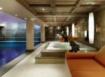 kings-avenue-luxury-chalet-courchevel-010-spa-area-with-indoor-swimming-pool-and-jacuzzi-hot-tub
