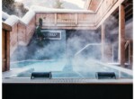 Jacuzzis humeantes mientras la nieve cae a tu alrededor, Ultima Spa, Ultima Gstaad